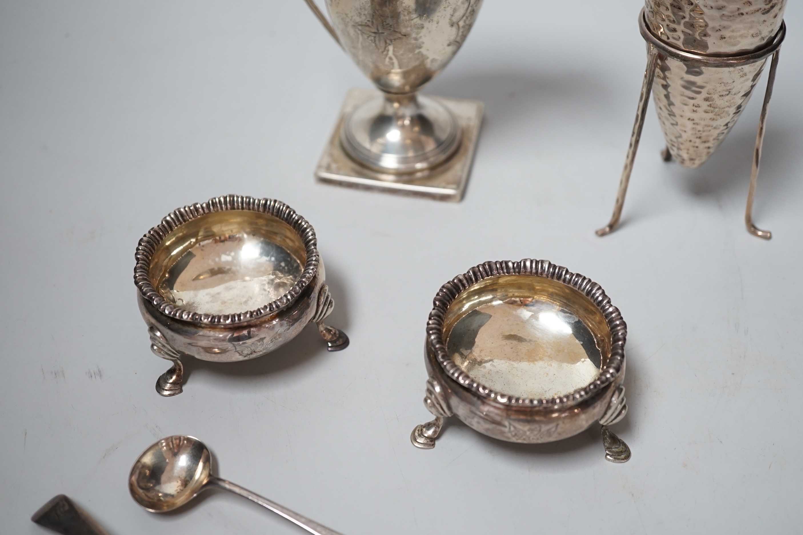 A pair of George III silver salts, London, 1778 and two later spoons, an Edwardian silver cream jug and a 925 specimen vase on stand.